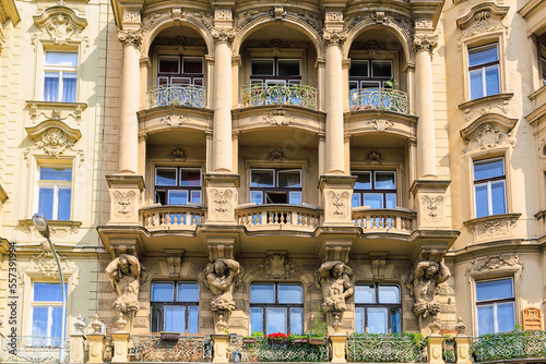 Photography Facade of the house of classical European architecture of the old cozy tourist city