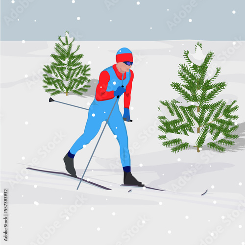 A skier rides on backcountry skis during a snowfall