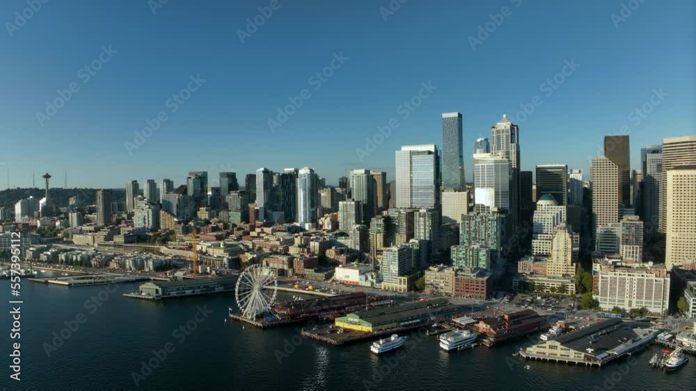 Drone shot of Seattle's downtown district from the Puget Sound's perspective. Drone shot of Seattle's downtown district from the Puget Sound's perspective.