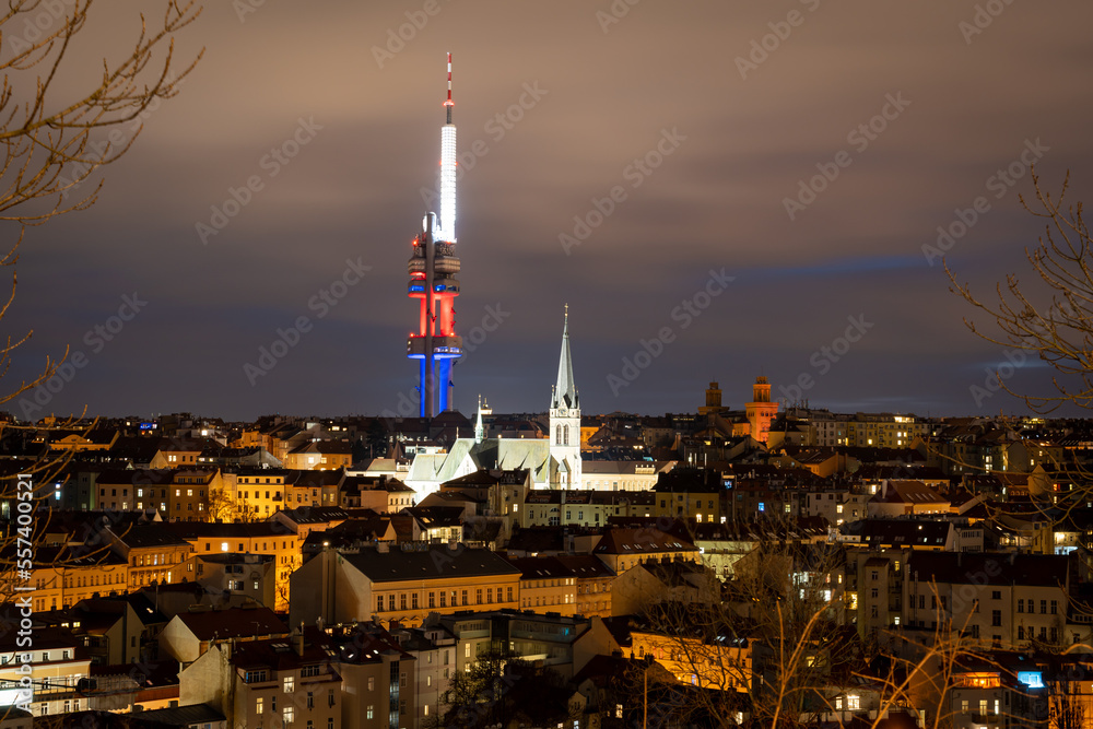 Skyline of Prague Zizkov district at night, view of the Church of Saint Procopius and The Zizkov Television Tower