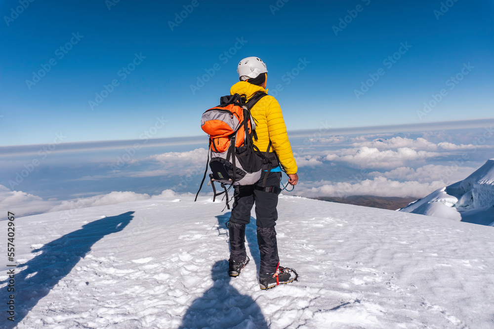 Hiker posing at camera on the trek in cayambe volcano