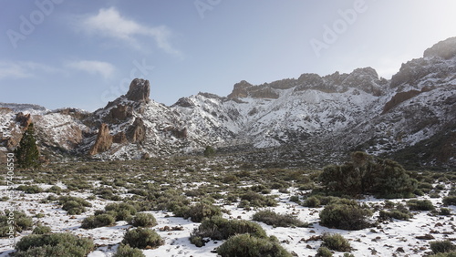 Teide National Park view on a snowy day in December 2022, Tenerife, Canary Islands, Spain, volcanic mountains covered with snow 