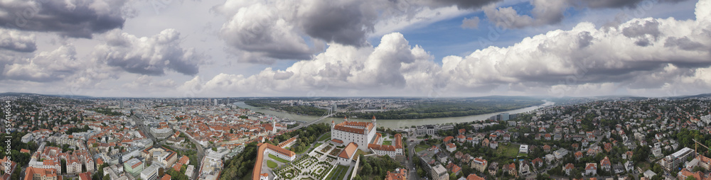 Bratislava, Slovakia. Aerial view of city castle and skyline at sunset. Panoramic viewpoint from drone