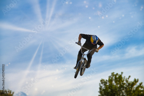 bmx bike in the sky space, exhilaration, park, racey, motion, adventure, ramp high, flight, black, concrete, fly, pursuit, culture, flying, recreational fast