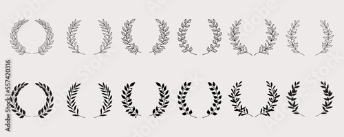 Set of black laurels branches. Flower ornament dividers collection. Hand drawn vector laurel leaves decorative elements. Vector illustration.