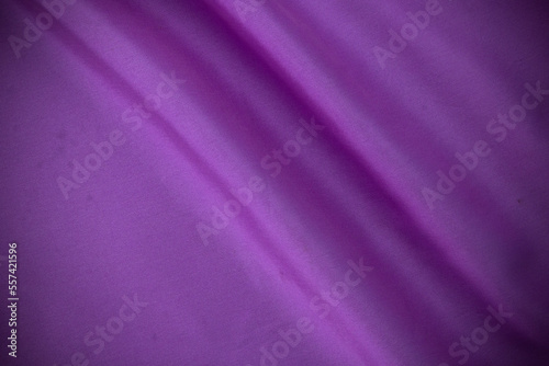 2 smooth purple cotton Texture, curved silk background, pattern. Texture of purple silk fabric. Beautiful emerald soft silk.