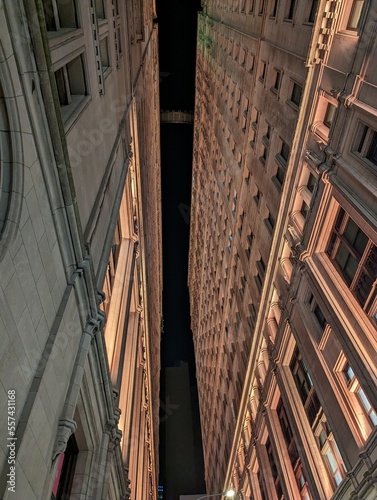 Картината върху платно Be sure to look up - wall street buildings as you look up in NYC