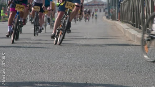Wallpaper Mural Cyclists Rush Along the Track. Many depersonalized cyclists move towards the camera and make a sharp turn. Shooting at a rate of 120fps Torontodigital.ca