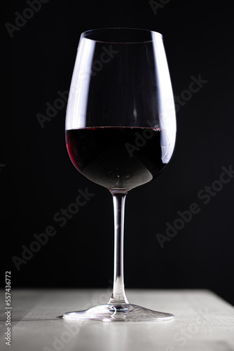 Glass of red wine on dark backgroud