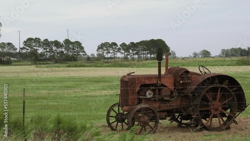 Rusty old tractor in a field