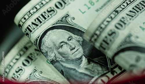 Obraz na plátně Uma caixa de dinheiro cheia de notas de hum dólar dos Estados Unidos
