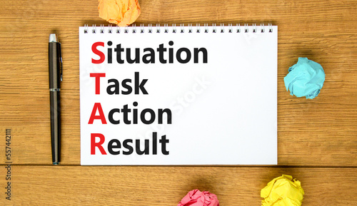 STAR situation task action result symbol. Concept words STAR situation task action result on white note on beautiful wooden background. Business STAR situation task action result concept. Copy space