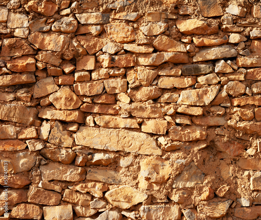Fototapeta premium Alte verwitterte Steinmauer,