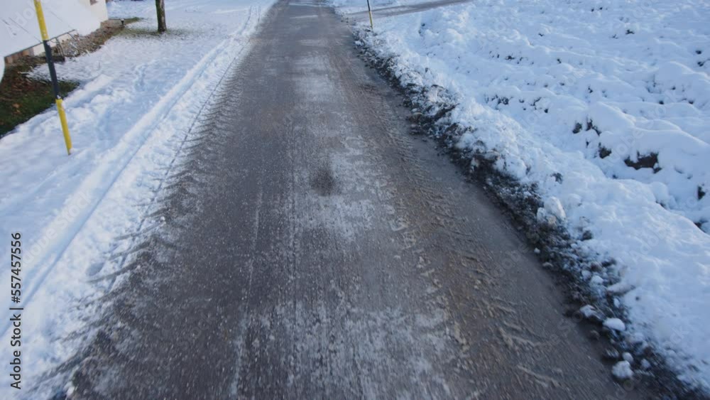 tractor tracks on snowed rural road road in winter tractor tracks on snowed rural road road in winter