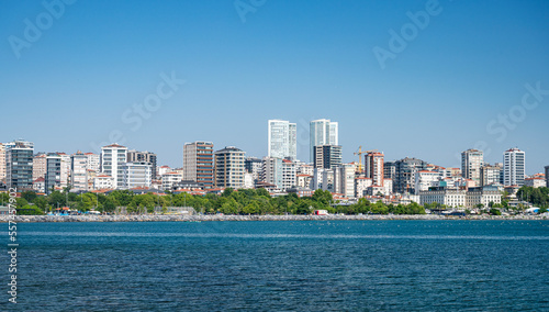 View from the sea to Istanbul. The coastline with new houses in the vicinity of the city. Summer panoramic landscape. © Kufotos