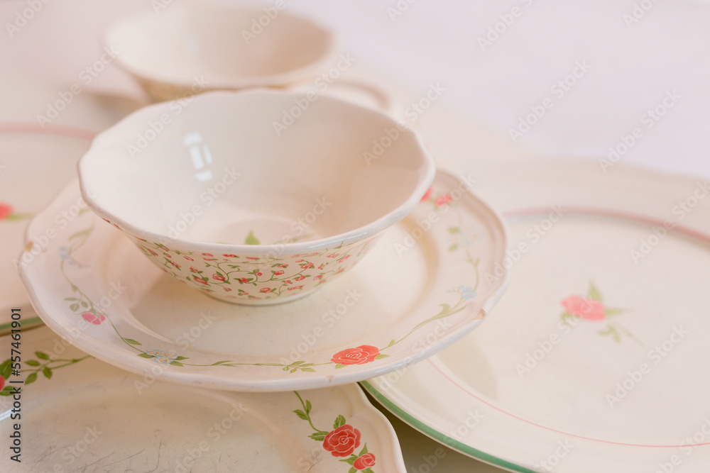 Closeup of porcelain plates and bowls