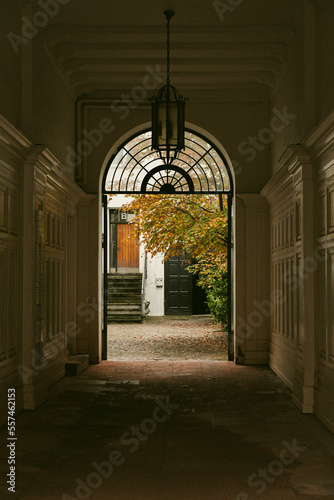 Passage to the autumnal courtyard of a residential building in Copenhagen  Denmark 