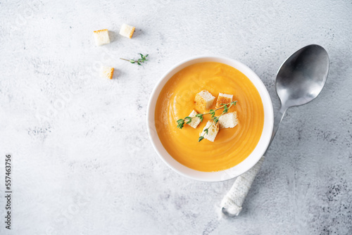 Sweet potato soup with croutons and thyme leaves