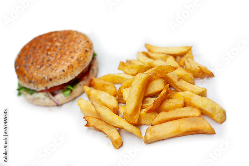 Tasty, fresh hamburger with french fries on a white table unhealthy food