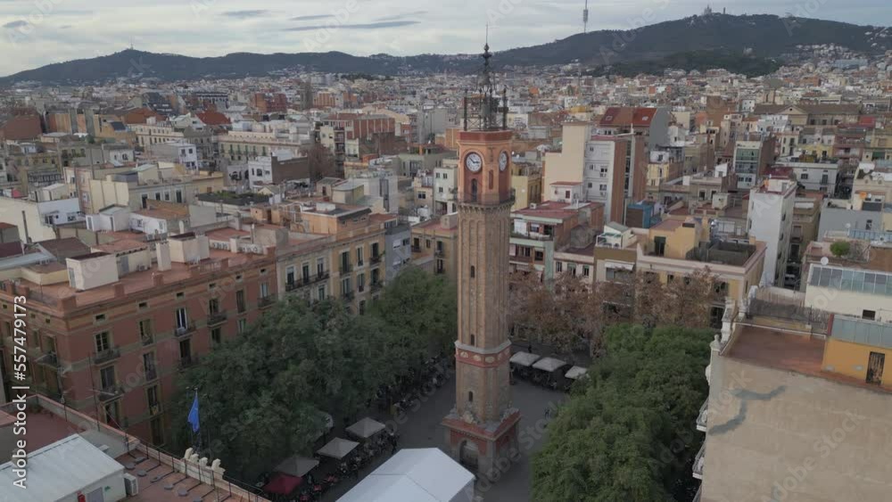 flying clockwise around Plaza Vila De Gracia in Barcelona Spain