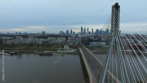 Aerial panorama of Warsaw, Poland with Swietokrzyski Bridge over the Vistual river and the city center on the horizon. photo