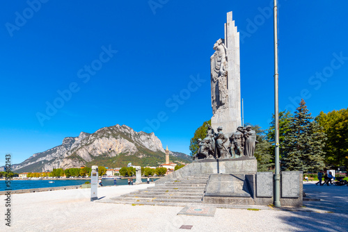 Fototapeta Naklejka Na Ścianę i Meble -  The Monument to the Fallen, or Monumento Ai Caduti, along the coast of the lakefront town of Lecco, Italy, in the southeastern area of Lake Como, in northern Italy. 