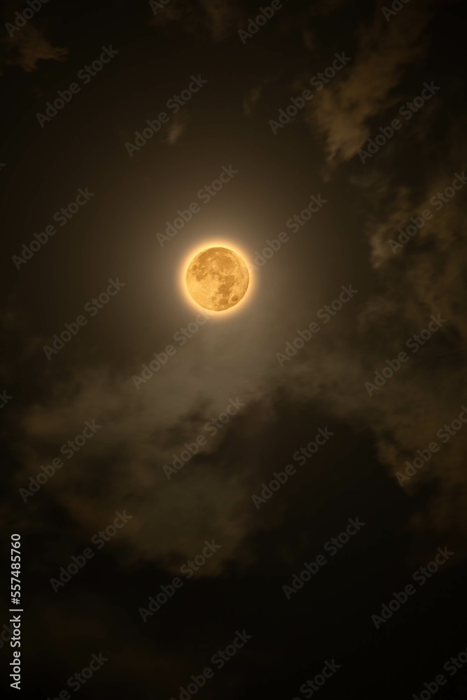 Beautiful magic fullmoon night sky with clouds and fullmoon and stars