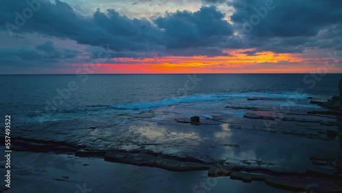 Aerial sunrise seascape with clouds at The Skillion in Terrigal, NSW, Australia. photo