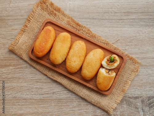 Combro indonesian traditional food on wooden tray, combro made of processed cassava root.