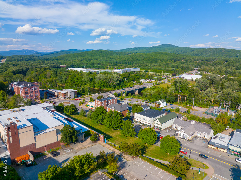 Main Street aerial view with White Mountain National Forest at the background in summer in town of Plymouth, New Hampshire NH, USA. 