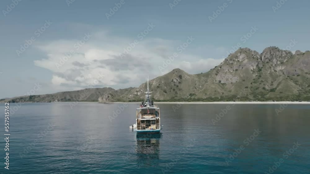 Aerial top view of a traditional boat in beautiful sea bay with turquoise crystal clear water, Aerial top view of a traditional boat in beautiful sea bay with turquoise crystal clear water,