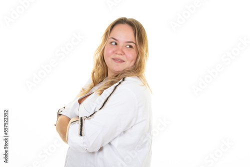 Smiling beautiful attractive young blond plus size body woman looking back on white background copy space