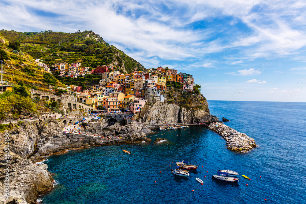 stone beach in italy, looks like a small village by the sea