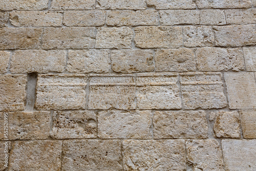 Text on wall near basilica San Nicola in Bari