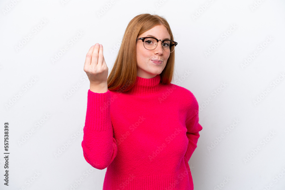 Young redhead woman isolated on white background making Italian gesture Young redhead woman isolated on white background making Italian gesture