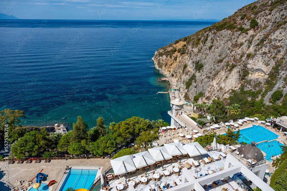 Naklejka premium View across rocky cove rugged cliffs of Pamukkale