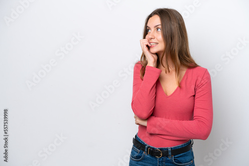 Young caucasian woman isolated on white background is a little bit nervous