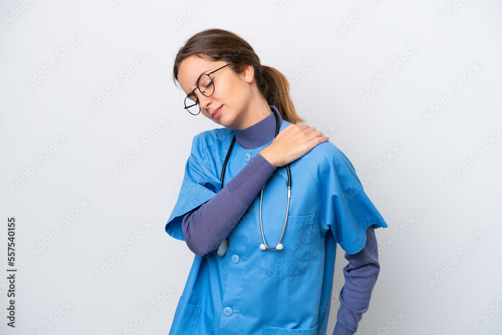 Young caucasian nurse woman isolated on white background suffering from pain in shoulder for having made an effort Young caucasian nurse woman isolated on white background suffering from pain in shoulder for having made an effort