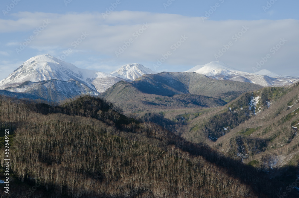 Shiretoko Mountain Range with Mount Rausu on the left. Hokkaido. Japan. Shiretoko Mountain Range with Mount Rausu on the left. Hokkaido. Japan.