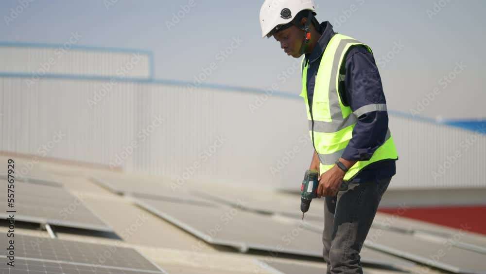custom made wallpaper toronto digitalEngineer on rooftop sitting next to solar panels photo voltaic check alignment for good installation
