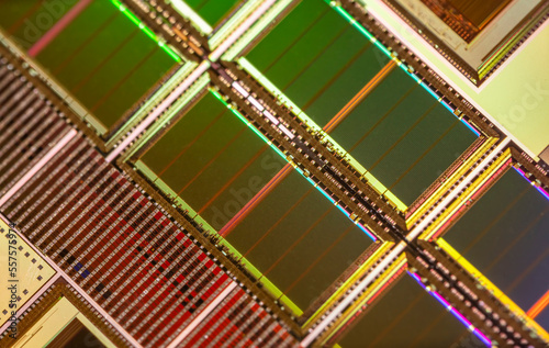 Silicon wafer with microchips used in electronics for the fabrication of integrated circuits. photo