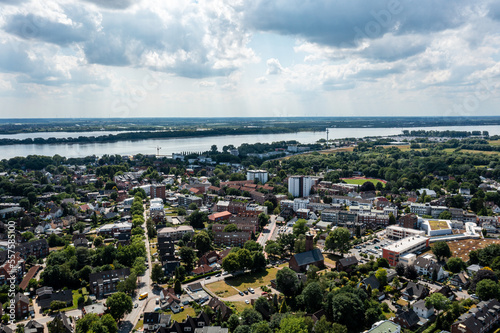 Fototapeta Naklejka Na Ścianę i Meble -  The city of Wedel near Hamburg from above ( Schleswig-Holstein Pinneberg and Elbe River region / Germany )