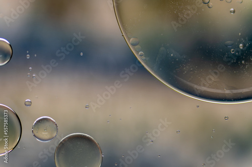 Abstract colourful bubbles. Soft background with blue and soft yellow colors.
