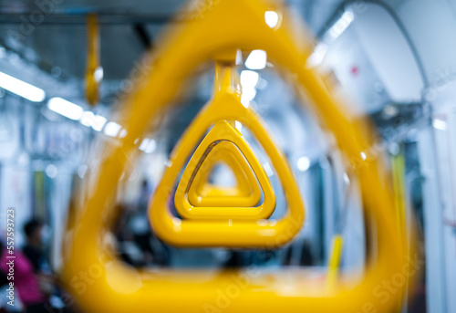 yellow handgrip, handgrip passenger pull handle, handgrip for train passengers, subway station