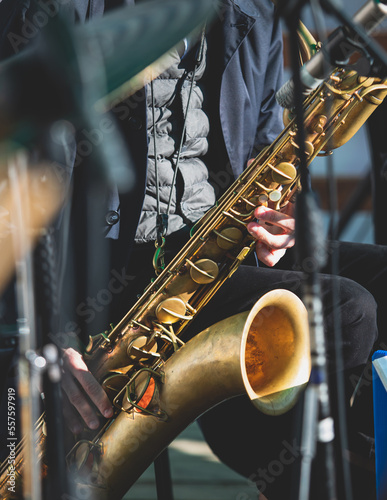 Photography Concert view of saxophonist, a saxophone sax player with vocalist and musical ba