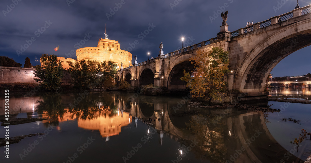 Old Historic Bridge, St. Angelo Bridge, over River Tiber at night. Rome, Italy.