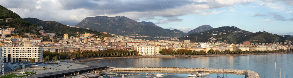 Touristic City by the Sea. Salerno, Italy. Aerial View. Cityscape and mountains background Panorama