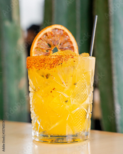 mezcal drink with maracuya fruit photo