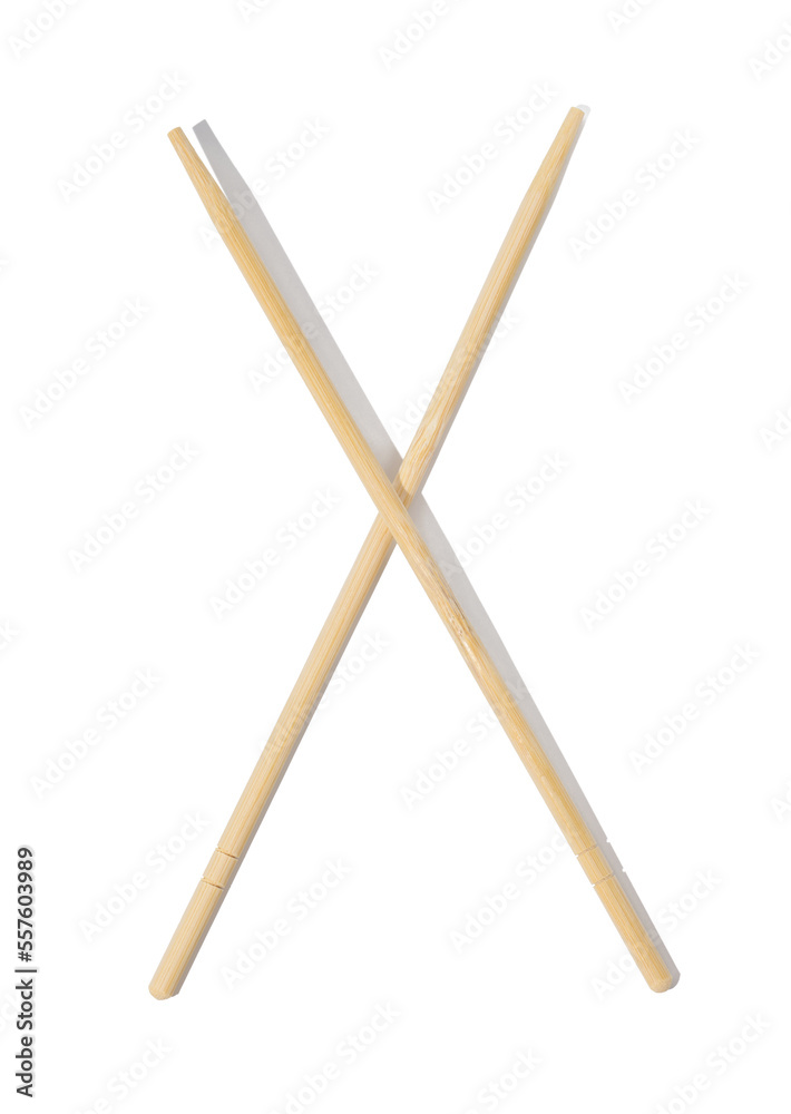 Two wooden chopsticks on a white isolated background, top view Two wooden chopsticks on a white isolated background, top view