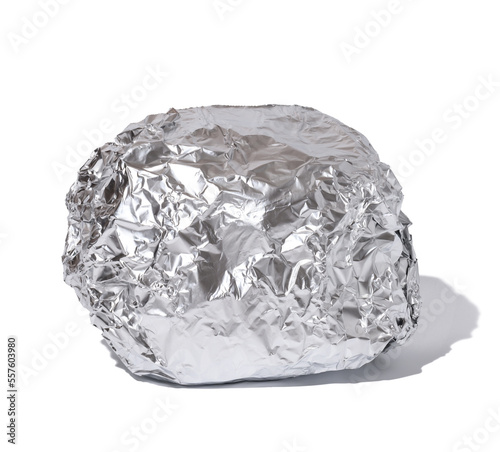 Crumpled piece of gray foil with shadow on a white isolated background